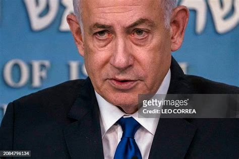 TOPSHOT - Israeli Prime Minister Benjamin Netanyahu speaks during a ...