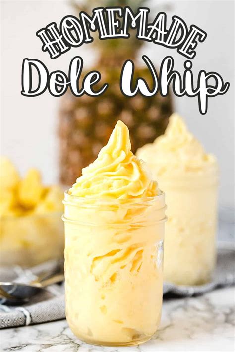 Homemade Dole Whip In A Glass With A Pineapple Behind It Pineapple