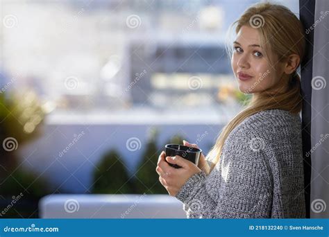 A Blonde Woman Enjoys A Morning Cup Of Coffee Stock Photo Image Of Peace Caucasian 218132240