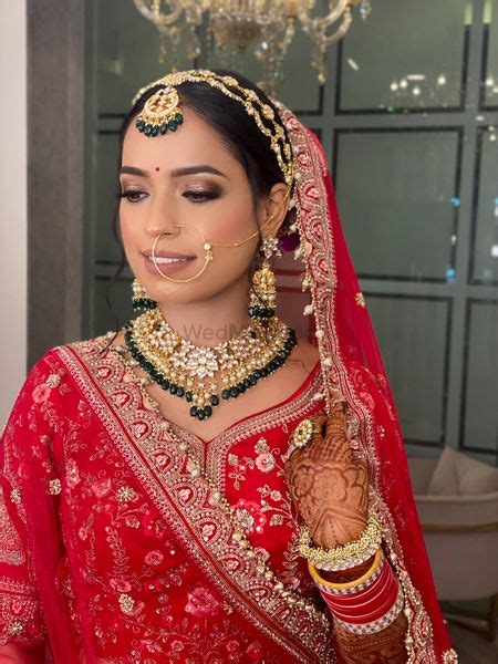 Photo Of Nude Subtle Bridal Makeup With Beige Lehenga