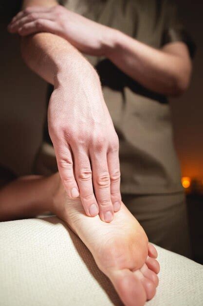 Premium Photo Close Up Massage Of A Female Foot Man Doing Foot