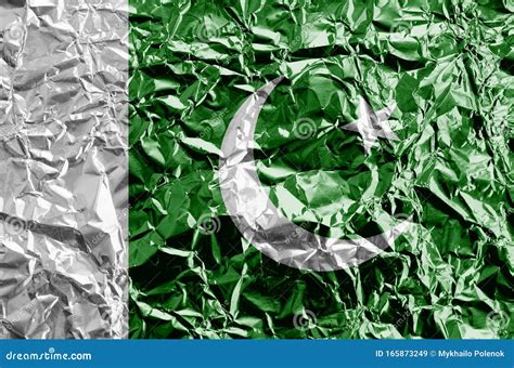 Pakistan Flag Depicted In Paint Colors On Shiny Crumpled Aluminium Foil