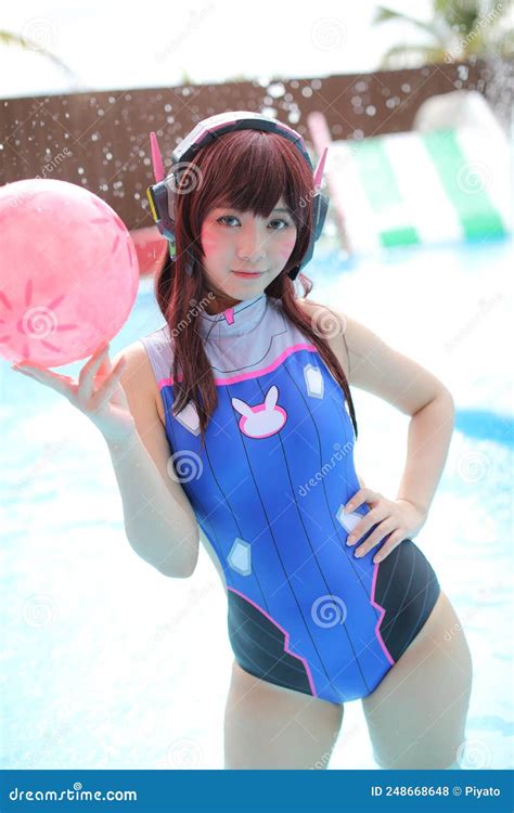 Portrait Of Japan Anime Cosplay Girl With Swim Suit At Swimming Pool