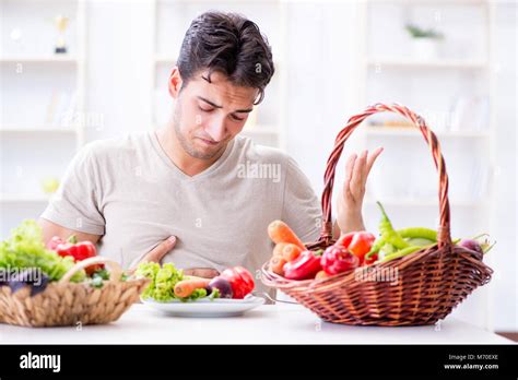 Young Man In Healthy Eating And Dieting Concept Stock Photo Alamy