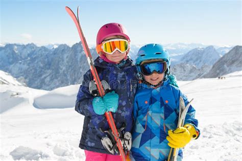 Smiling Children Enjoying Winter Vacations in Mountains . Stock Image ...