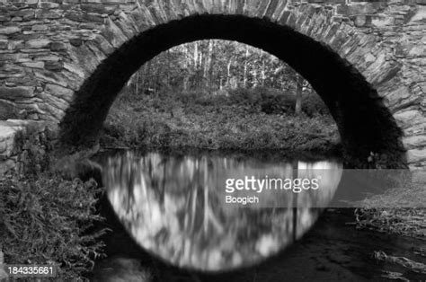 Historic Stone Arch Bridge Over Water High Res Stock Photo Getty Images