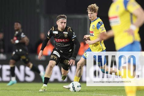 Stvv S Adriano Bertaccini And Westerlo S Arthur Piedfort Fight For The