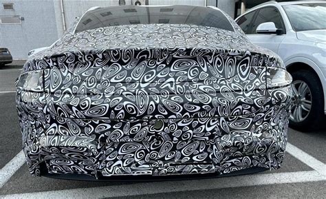 Xiaomi electric sedan revealed in spy photos - ArenaEV