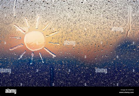 Water drop forming a sun Stock Photo - Alamy