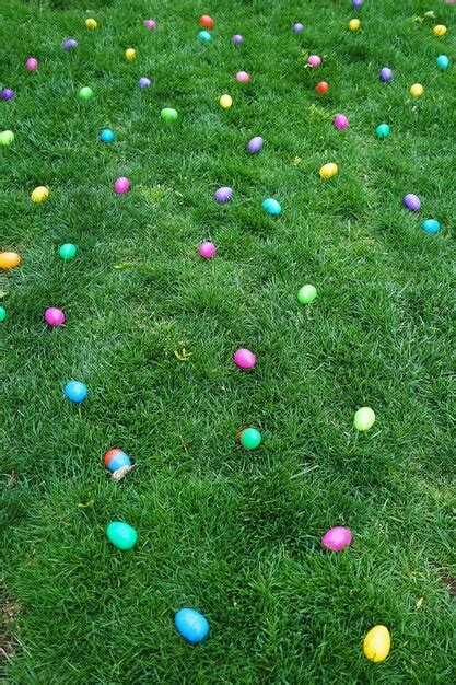 Premium Photo Colorful Easter Eggs On Green Grass