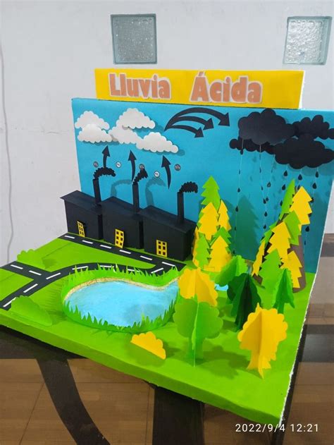 A Paper Model Of A Landscape With Trees And Buildings In The Background