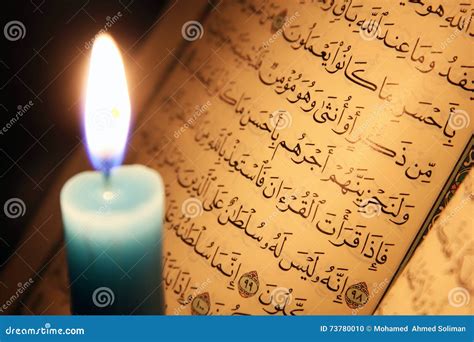 Koran or Quran Holy Book with Candle on Candlelight Stock Photo - Image ...