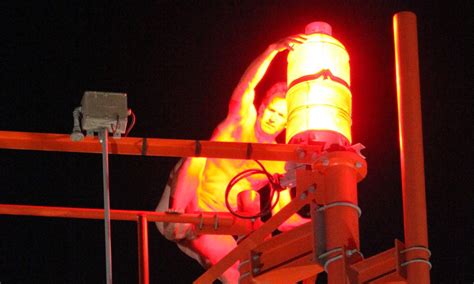 Naked Man Sits On Top Of Ft La Police Communications Tower Singing Onward Christian
