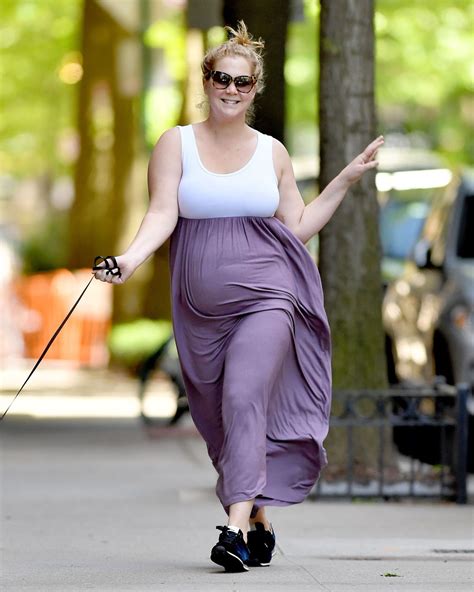 Pregnant AMY SCHUMER Out with Her Dog in New York 05/18/2019 – HawtCelebs