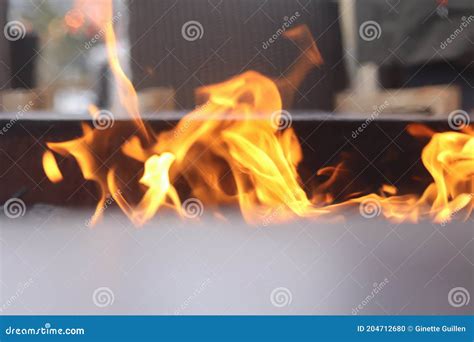 Fire in a Fire Pit Outside of a Restaurant Stock Photo - Image of ...