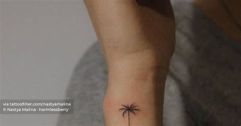 Fine Line Palm Tree Tattoo Done On The Wrist