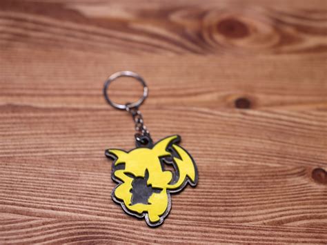 Pikachu Evolution Keychain, Keyring Features Pikachu and Raichu / 3D ...