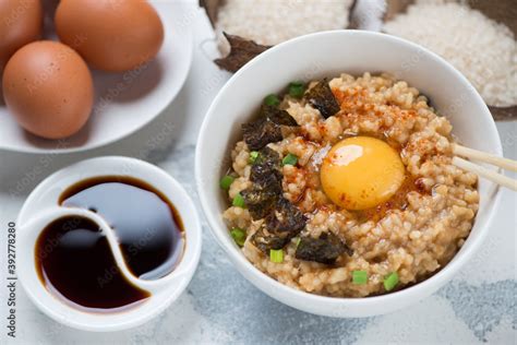 Bowl Of Tamago Kake Gohan Or Japanese Rice Mixed With A Raw Egg And