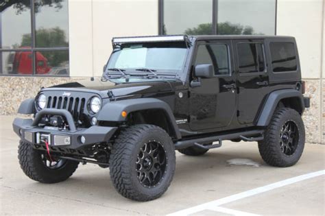 2015 Black Jeep Wrangler 4 Door Lifted on 35s 8 miles