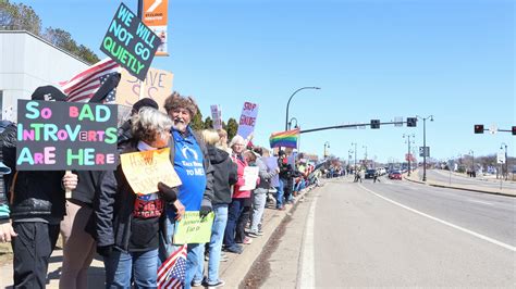 St. Cloud residents protest Trump, Musk in "Hands Off!" protest