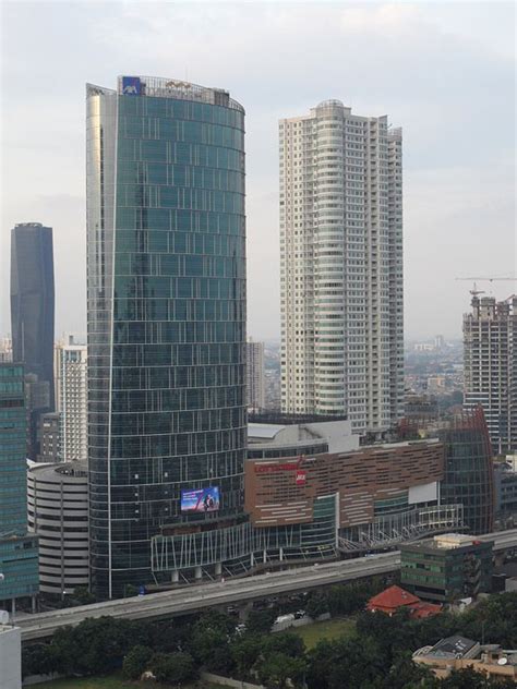 AXA Tower (The Oval, The Office by Kuningan City), Kuningan City,Jakarta, 195 m, completion 2012 ...