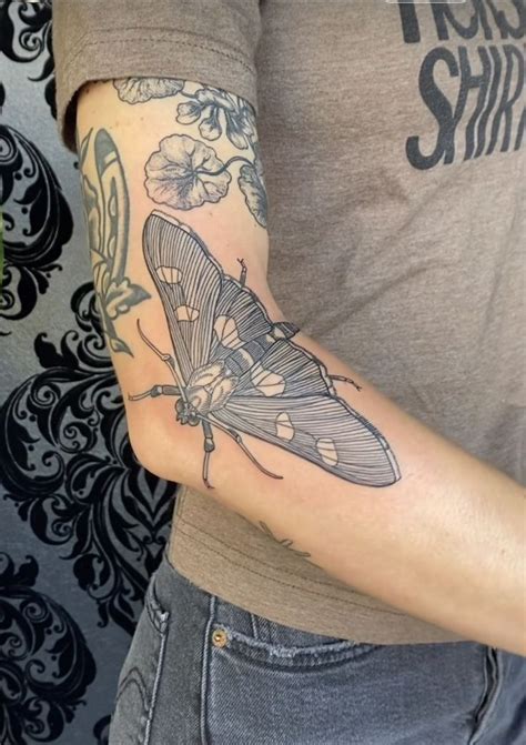 Large Moth arm tattoo | Body art tattoos, Body tattoos, Tattoos