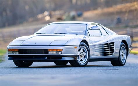 Download Stunning Red Ferrari Testarossa On Open Road Wallpaper