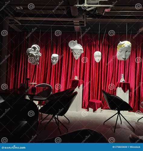 A Theatre Interior with Masks Hanging on the Ceiling Stock Photo ...