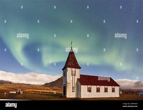 Northern Lights Aurora Borealis Over The Church At Hellnar On The