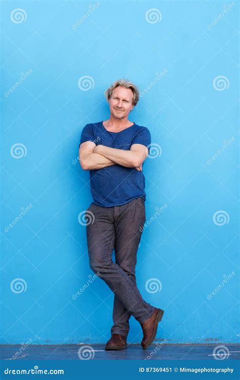 Confident Mature Man Standing With Arms Crossed Stock Image Image Of Arms Aged