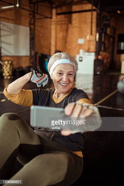 Old Woman Flexing Photos And Premium High Res Pictures Getty Images