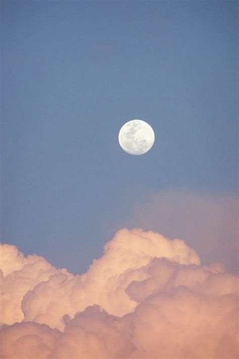 Daytime Moon Above Clouds