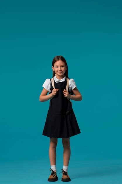 Free Photo | Portrait of young girl student in school uniform