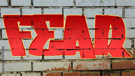 The Word Fear As Graffiti On A Brick Wall Stock Photo And Royalty