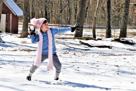 Little Girl Throwing Snowball Free Stock Photo - Public Domain Pictures