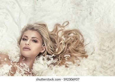 Delicate Sensual Naked Woman Lying FeathersẢnh có sẵn Shutterstock