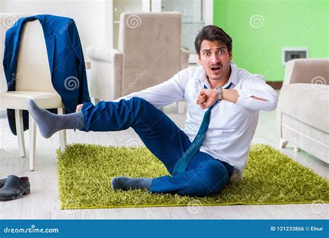 The Man Dressing Up And Late For Work Stock Photo Image Of Employee