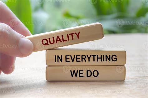 Quality in everything we do text on wooden blocks. Business quality