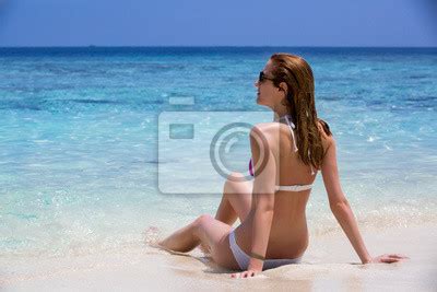Sexy Woman In Bikini Lying And Sunbathing On Tropical Beach Posters For The Wall Posters