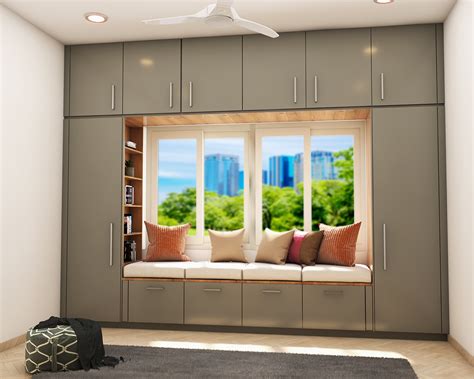 Spacious Wardrobe Design With Storage Seater Space | Livspace