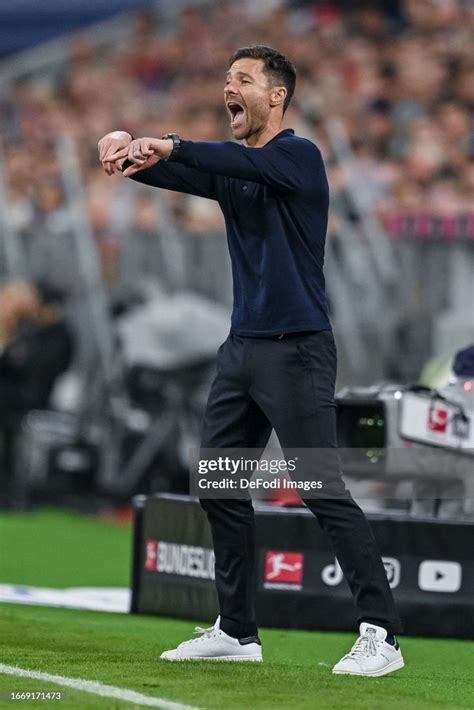 head coach Xabi Alonso of Bayer 04 Leverkusen gestures during the ...