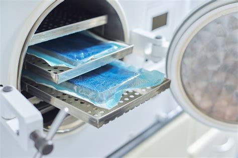 Sterilization Of Medical Dental Instruments In Autoclave Stock Photo