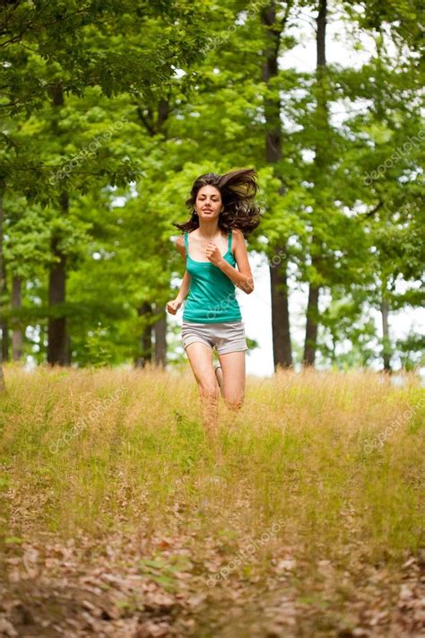 Beautiful Girl Running Through Forest — Stock Photo © Xalanx 2211603