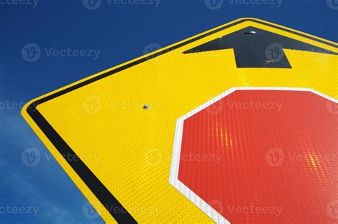 Stop Ahead Road Sign on Blue Sky 16355703 Stock Photo at Vecteezy