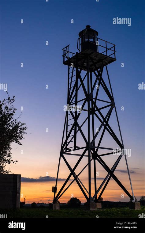 Construction And Silhoutte Of Old Lighthouse On A Former Island In The