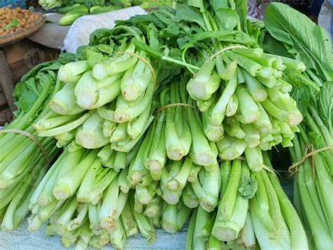 Bulk Of Raw Green Chinese Mustard Vegetables In Traditional Market