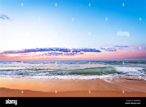 Sunrise Light Shining On Ocean Waves Stock Photo Alamy