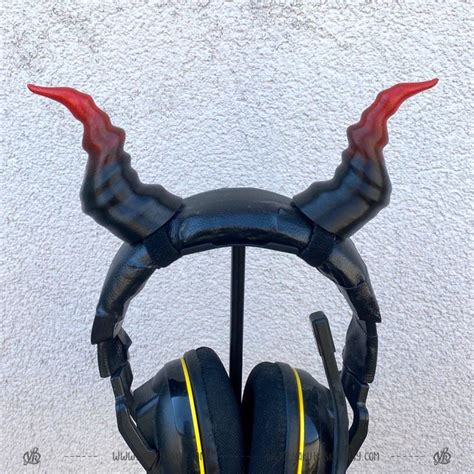 a pair of headphones with horns attached to the headset are shown in ...