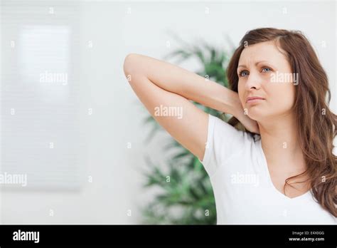 Brunette Touching Her Painful Neck Stock Photo Alamy