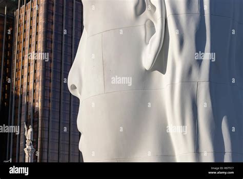 Julia White Marble Sculpture By Jaume Plensa In Plaza Colon With Colon